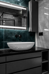 Czarna szafka pod umywalkę wykonana na wymiar.